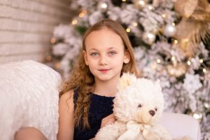 christmas girl with teddy bear