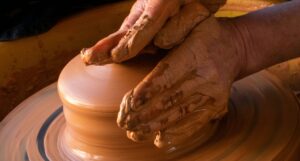 Potter shaping clay on a wheel as a symbol of spiritual formation in Christian ministry