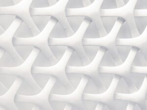 Abstract interwoven white geometric pattern representing complexity and Christian counselling formation